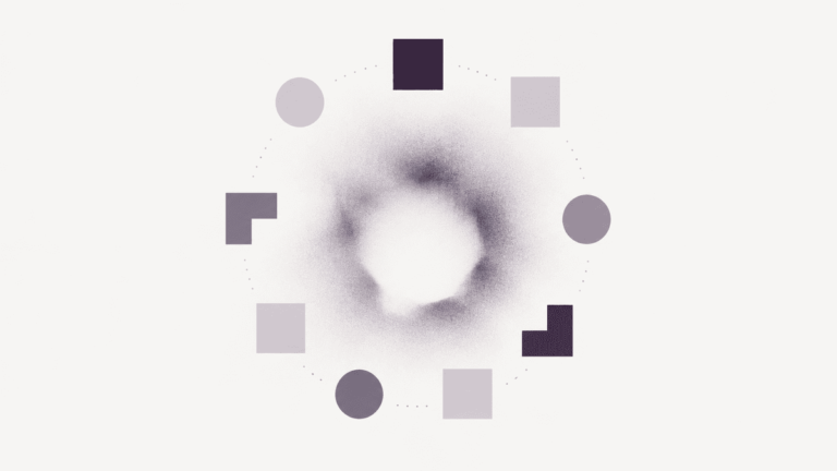 Geometric shapes arranged in a ring around a grainy, hollow center.